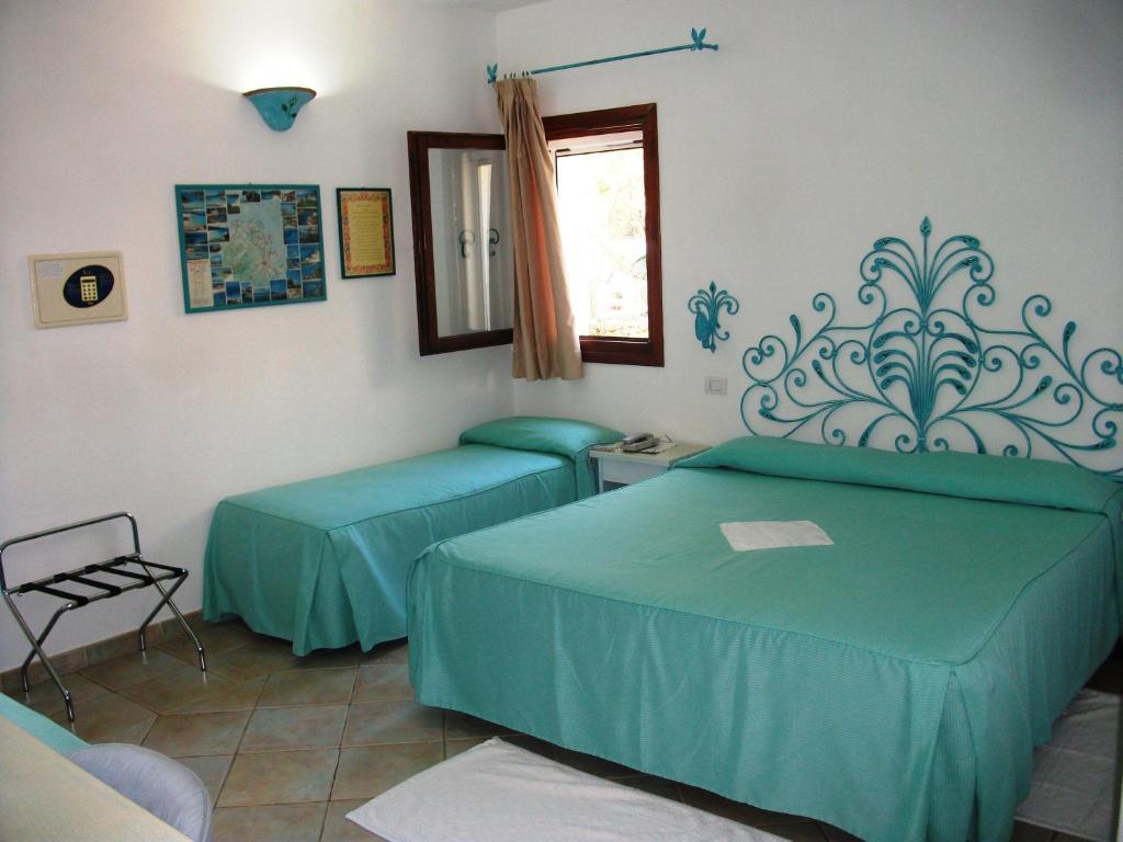 Hotel Villa Gemella Baja Sardinia Bilik gambar